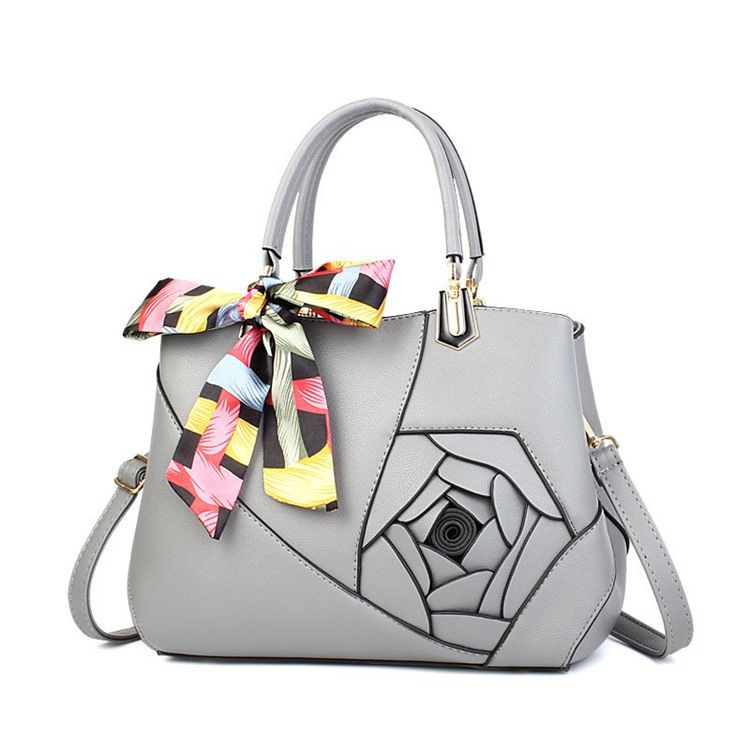 Bolsa Bowtie Pu Floral