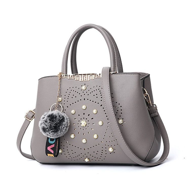 Bolsa De Mão Oca De Pu De Mola