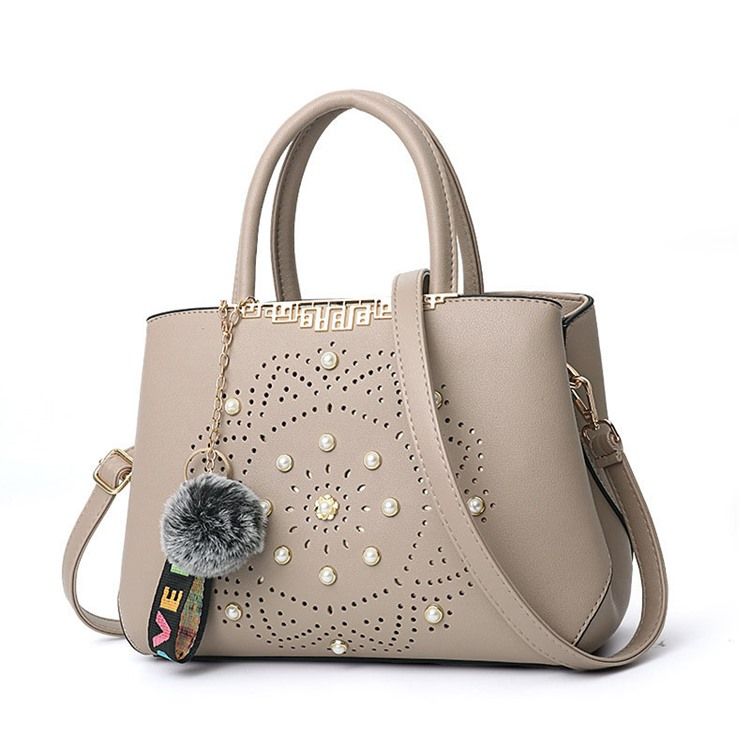 Bolsa De Mão Oca De Pu De Mola